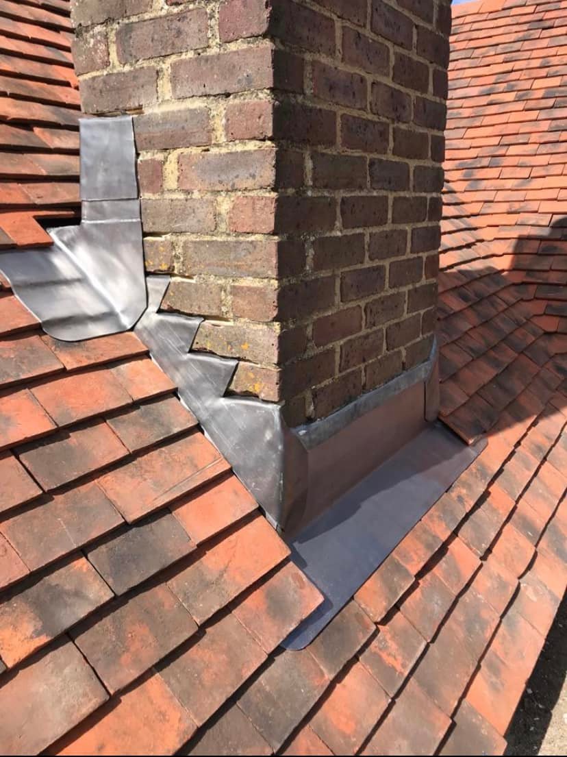 Leadwork around chimney abutment – specialist roof detailing by ACCRBS