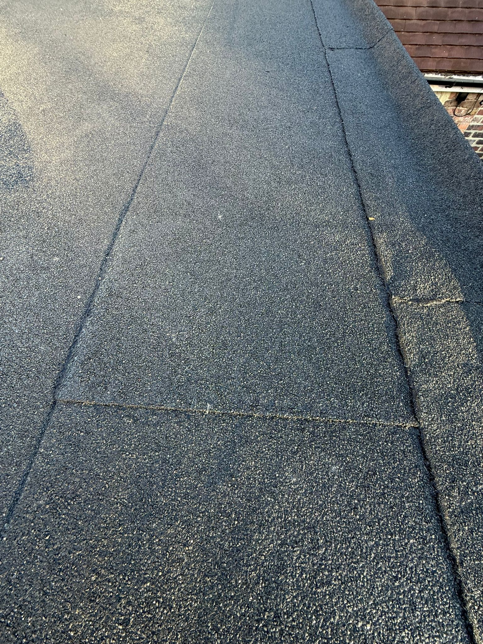 Flat roof detail around skylight and upstand